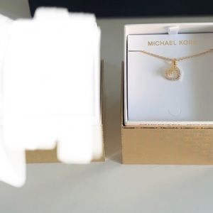 Brand New Gold Michael Kors Adjustable 3 charm bracelet